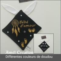 Doudou lapin noir et blanc