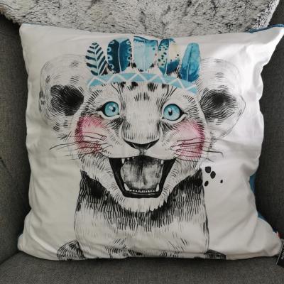 Coussin lion bleu